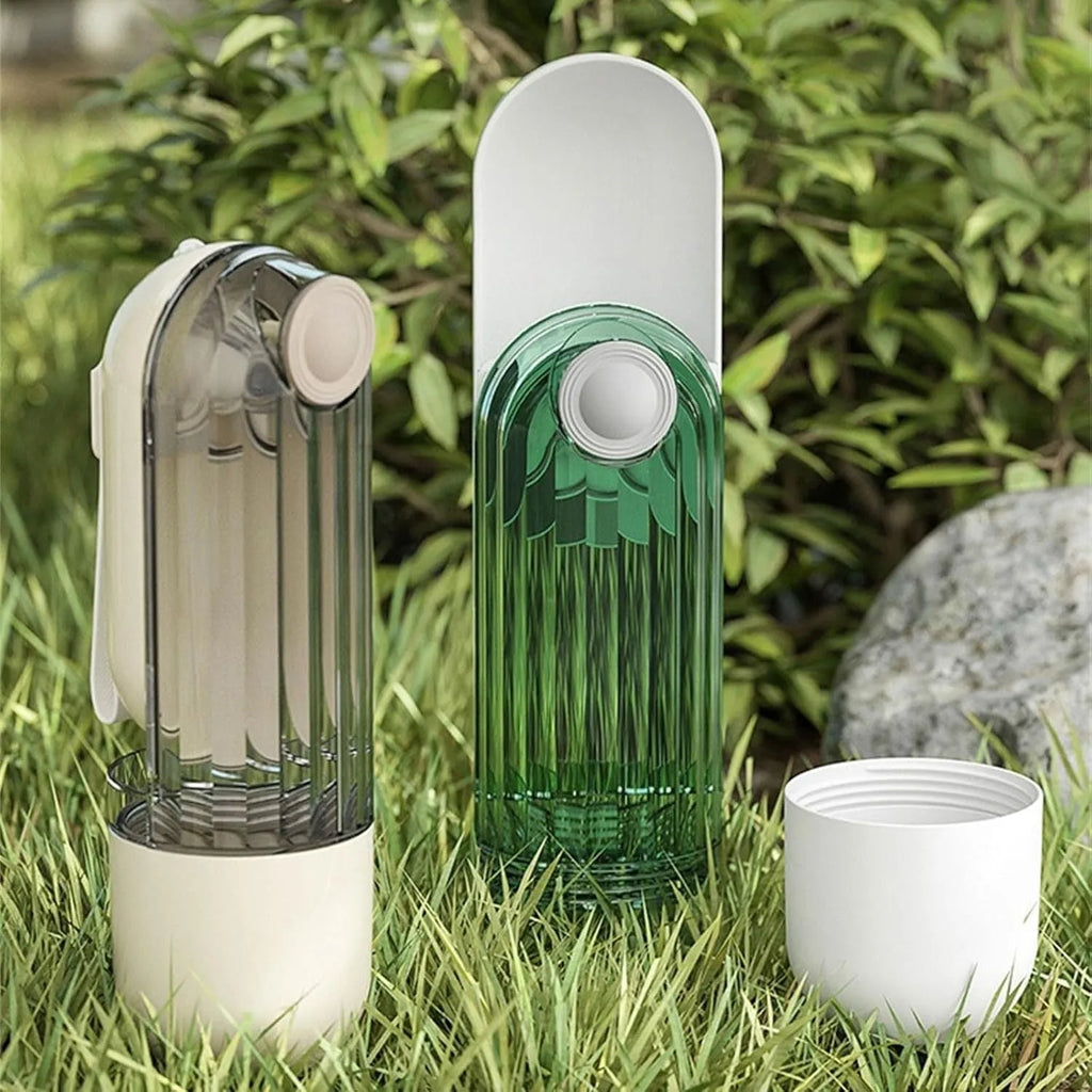 Beige and green foldable dog water bottle with food dispenser for outdoor use