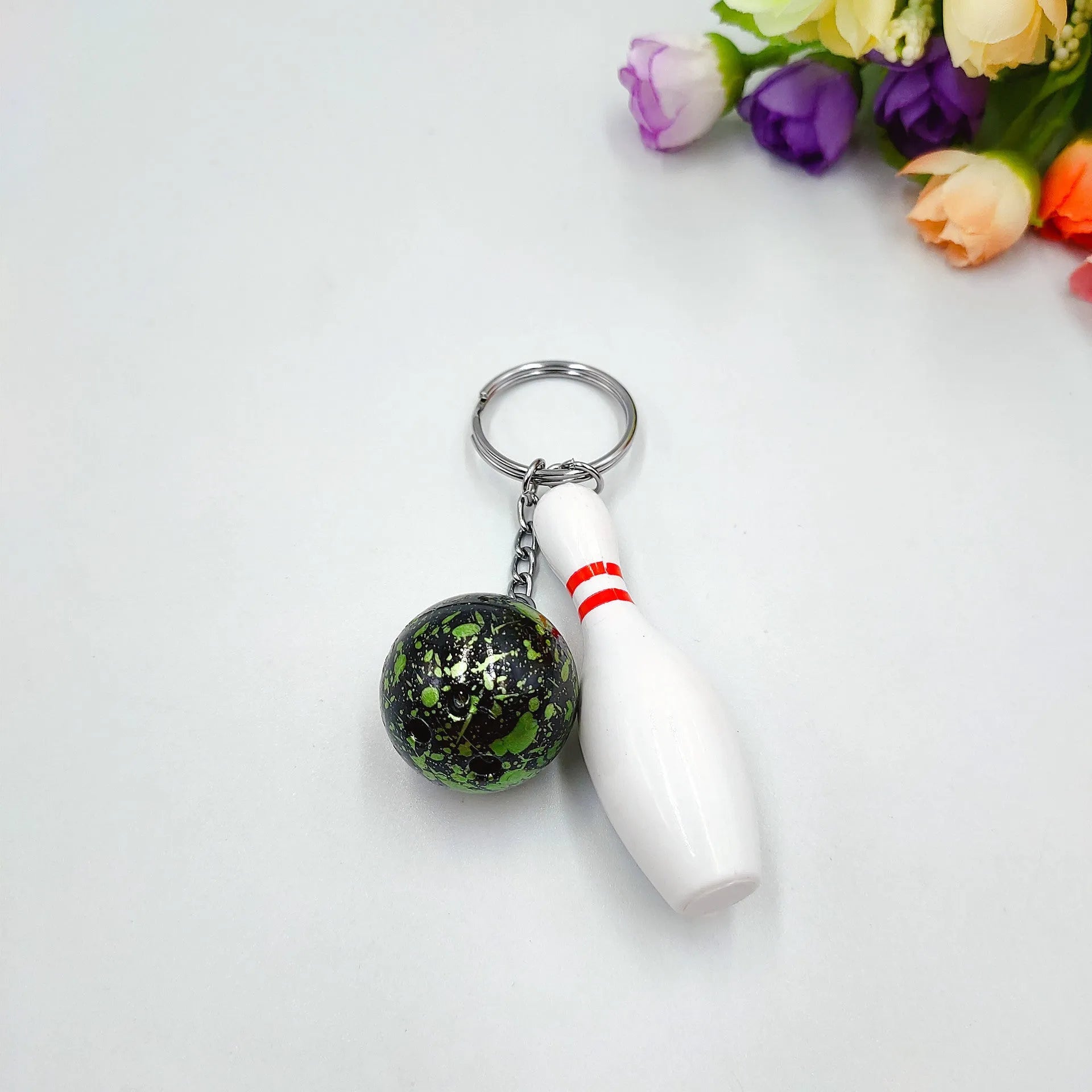 Mini simulation bowling ball keychain pendant in dark red, blue, purple, or green colours