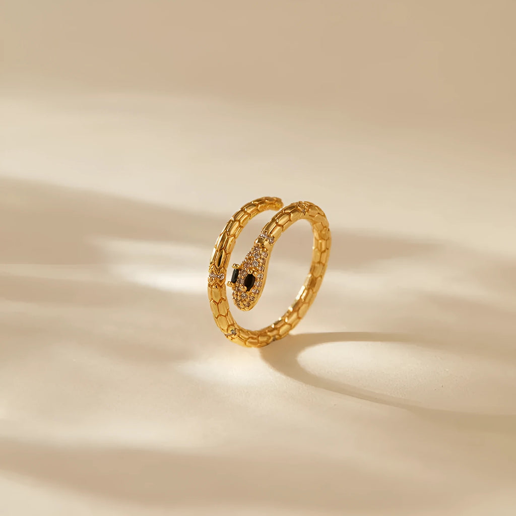 Snake-shaped adjustable copper ring with 18K gold colour finish and detailed animal modelling