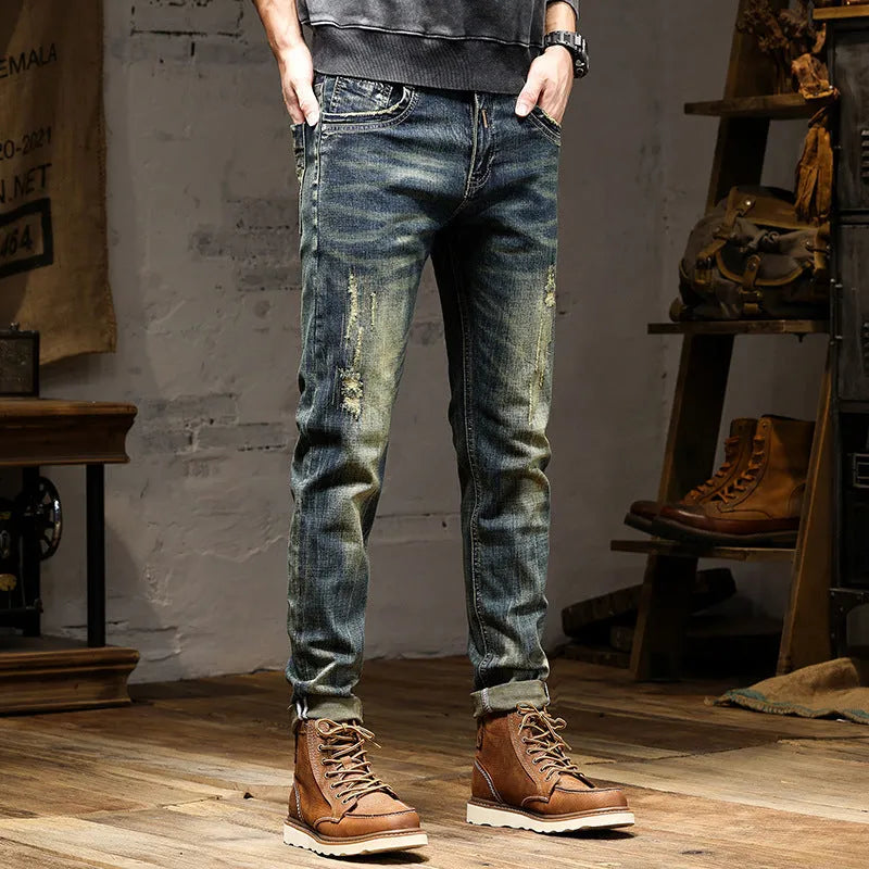 Men's skinny jeans in retro colour with zip fly, showing stretch denim fabric and slim pencil pants cut