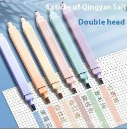 Double-headed fluorescent marking pens showing two different coloured tips on each pen