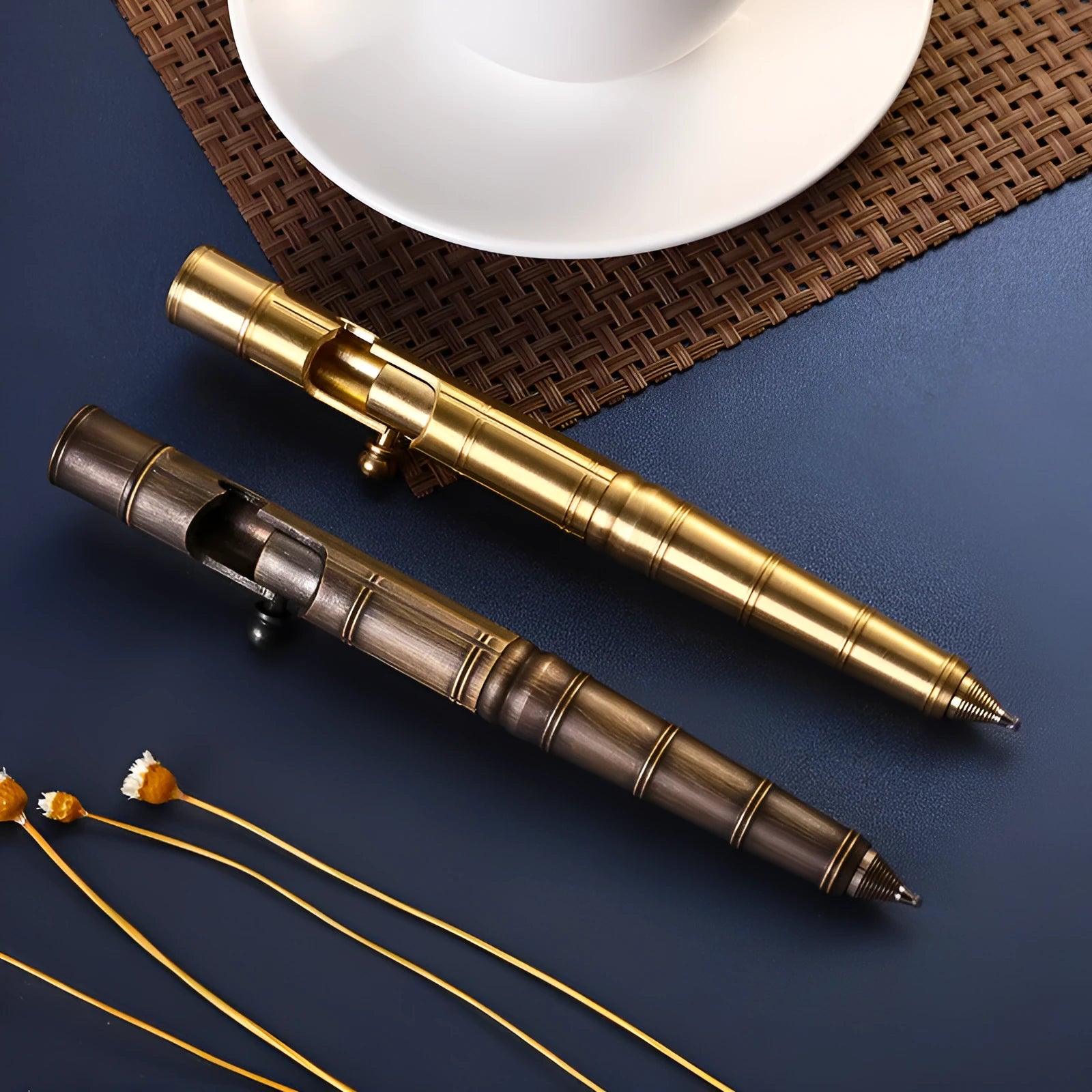 Brass tactical pen with bolt-action mechanism and retro brushed finish