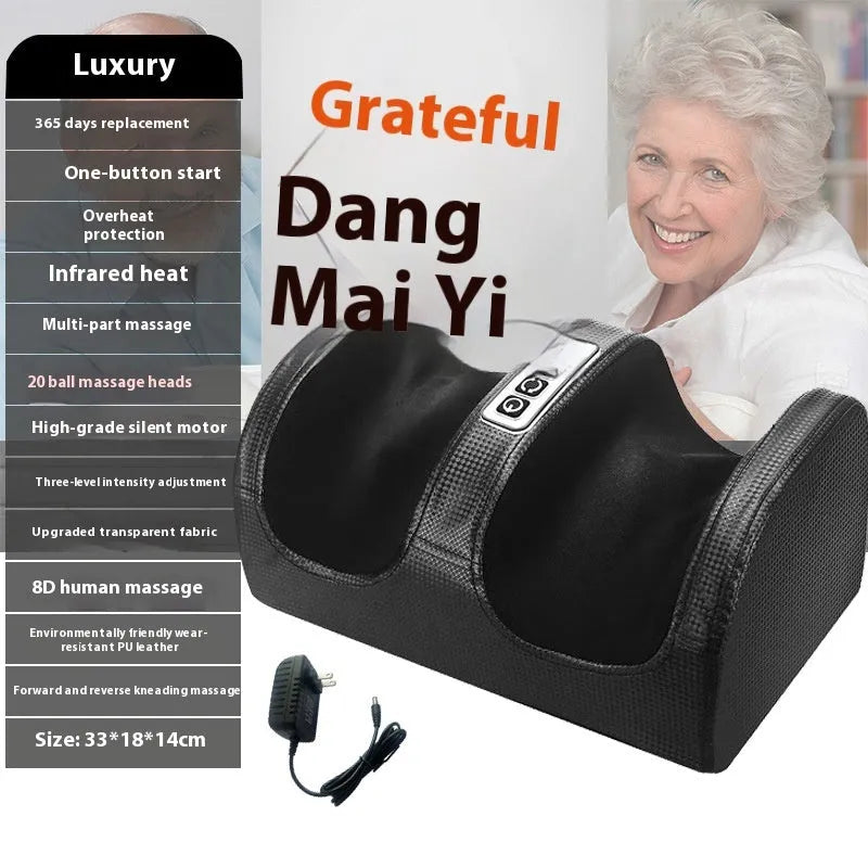 Automatic foot massage machine in gold colour with remote control on a wooden floor.