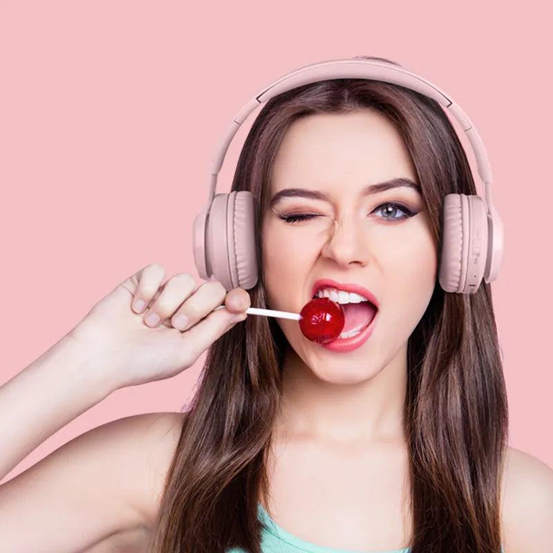 Wireless children's headphones in bunny pink and purple with RGB lights and power display