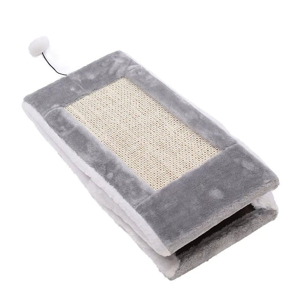 Grey and white triangle-shaped cat scratching post with an integrated plush fur bed for lounging.