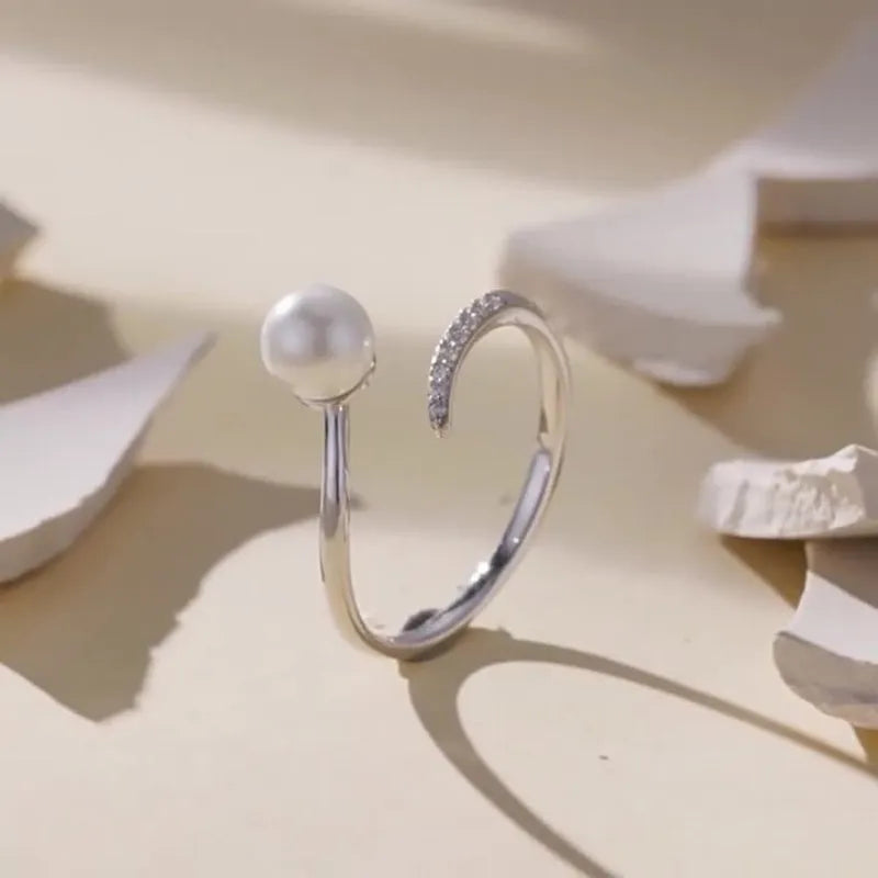 S925 sterling silver adjustable ring with natural shell pearls and opening loop design