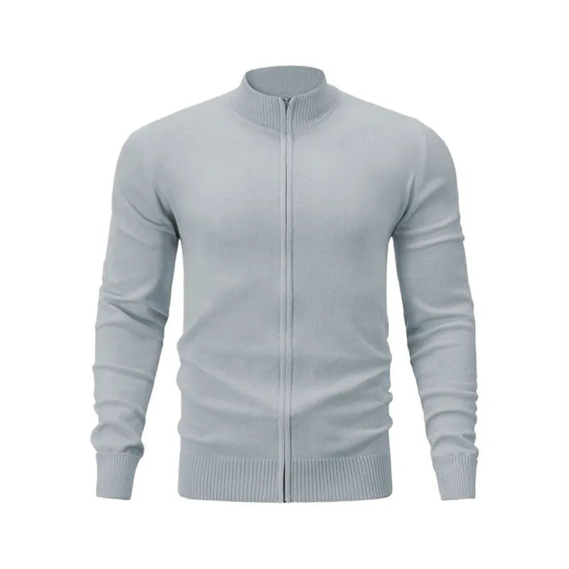 Man wearing a zip-front cotton cardigan in a solid colour, showcasing the stand collar and loose fit.