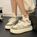 Green women's casual shoes with PU mesh upper and flat heel