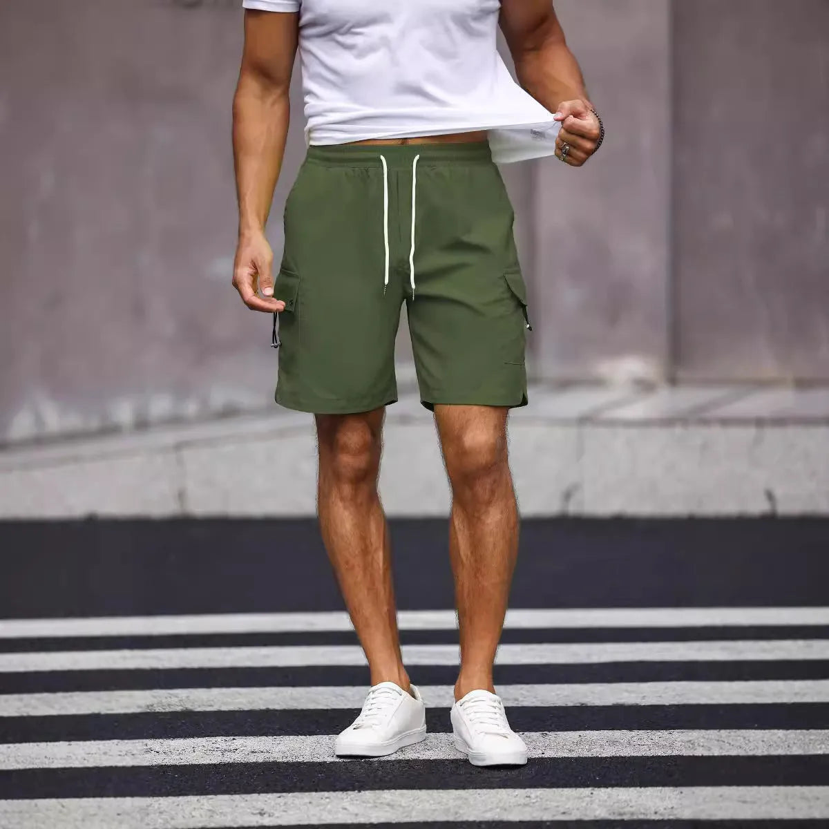 Men's loose fit work shorts in fluorescent green and army green colours with straight leg design
