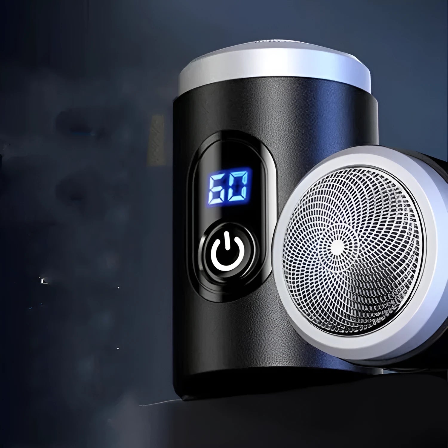Black portable USB rechargeable shaver with cleaning brush and cable on a white background.