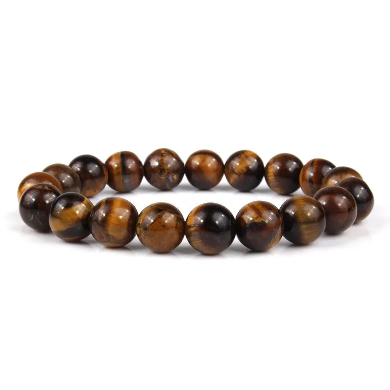Natural tiger eye crystal beaded bracelet for men and women on a white background.