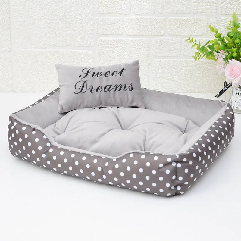 Square polka dot print dog bed with raised sides and a matching embroidery pillow for small dogs.