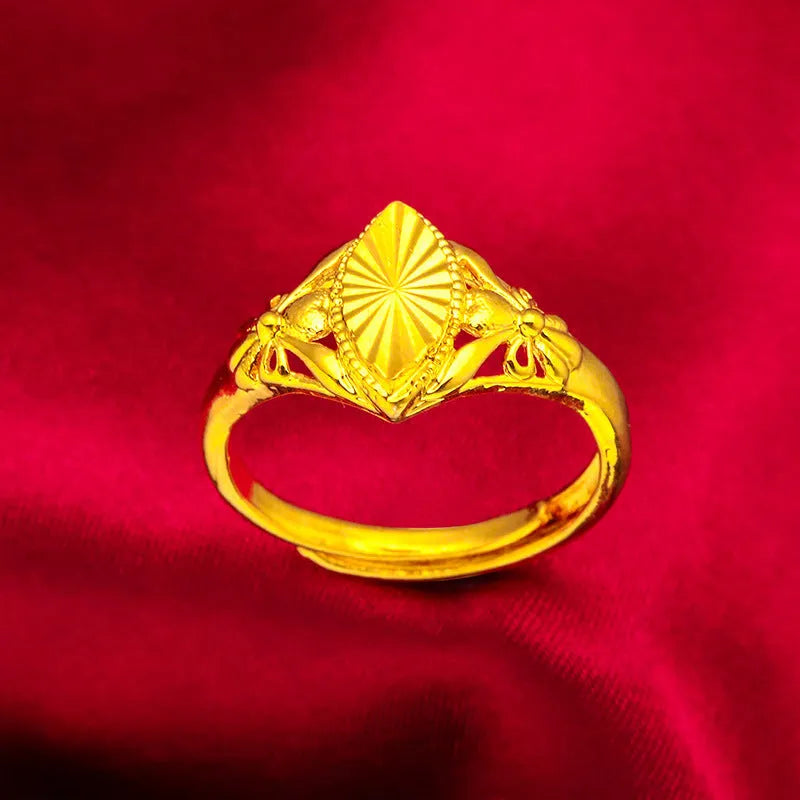 Gold electroplated open geometric flower ring with textured brass construction