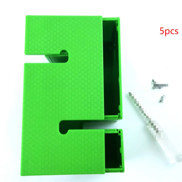 Set of coloured ABS plastic tower blocks with pull ropes and metal hook frame for outdoor team building games.