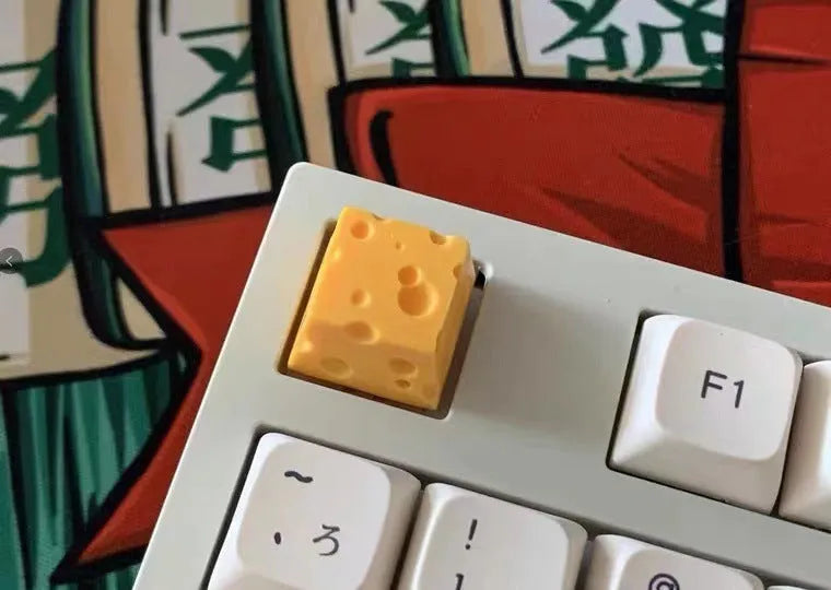 Yellow resin cheese-themed artisan keycap for mechanical keyboards with Cherry MX compatibility