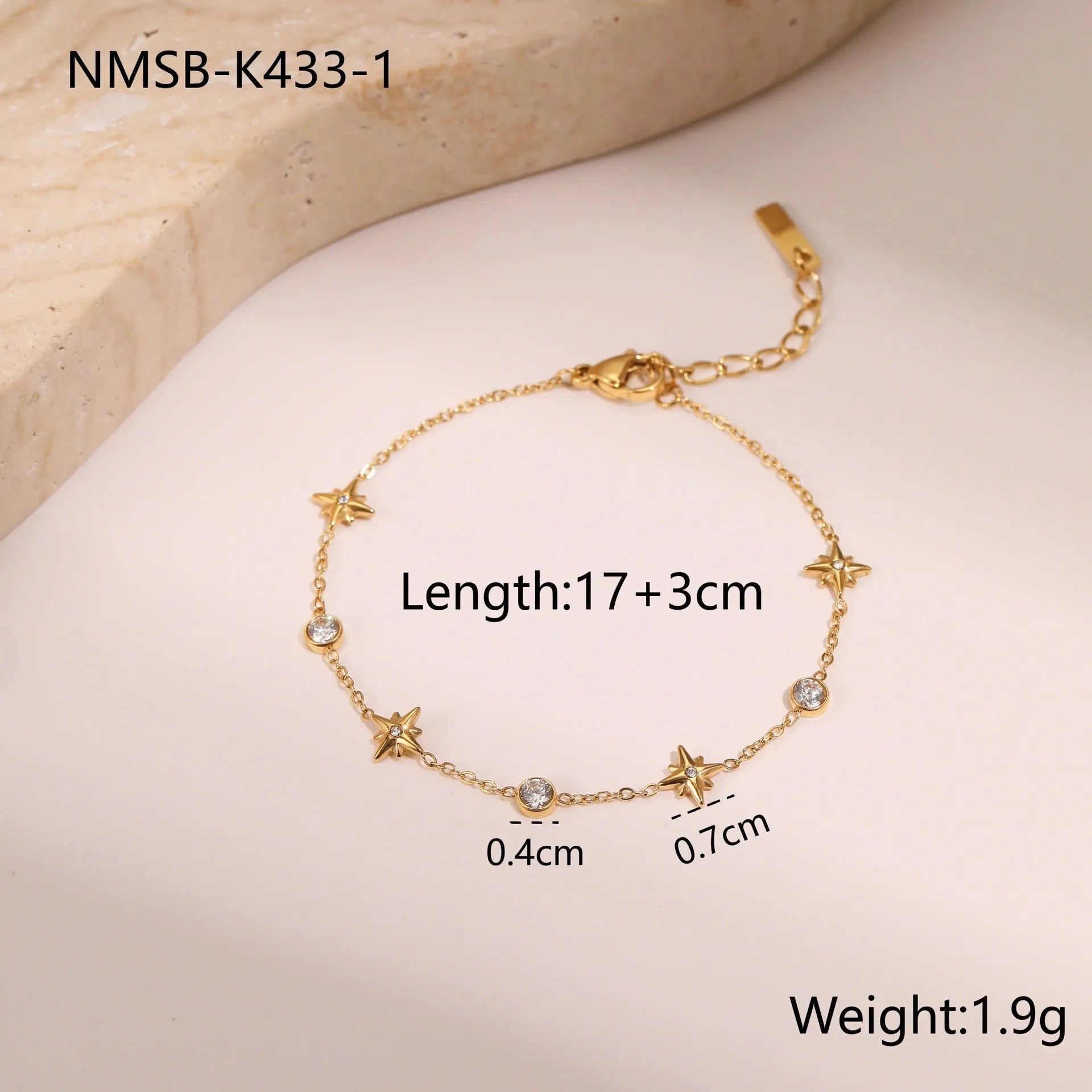 Stainless steel women's bracelet with geometric star pendant featuring hexagonal elements and gold plating