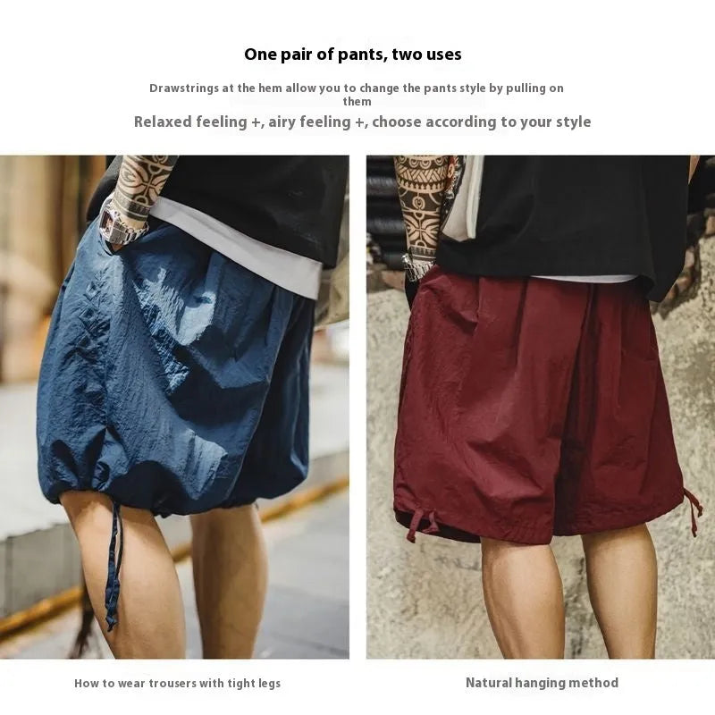 Men's loose fit embroidered beach shorts in Prussian Blue with thin nylon fabric