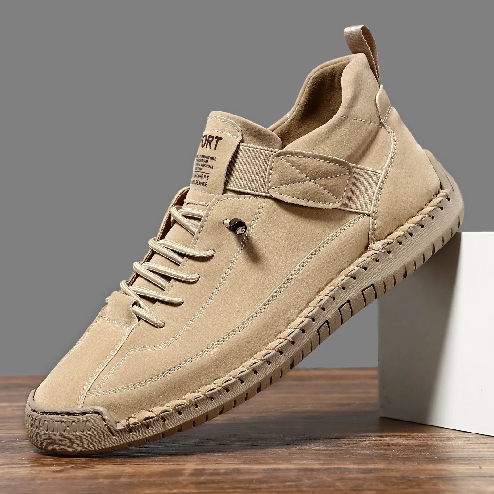 Men's mid-top Martin boot in a solid colour with elastic band and round toe.
