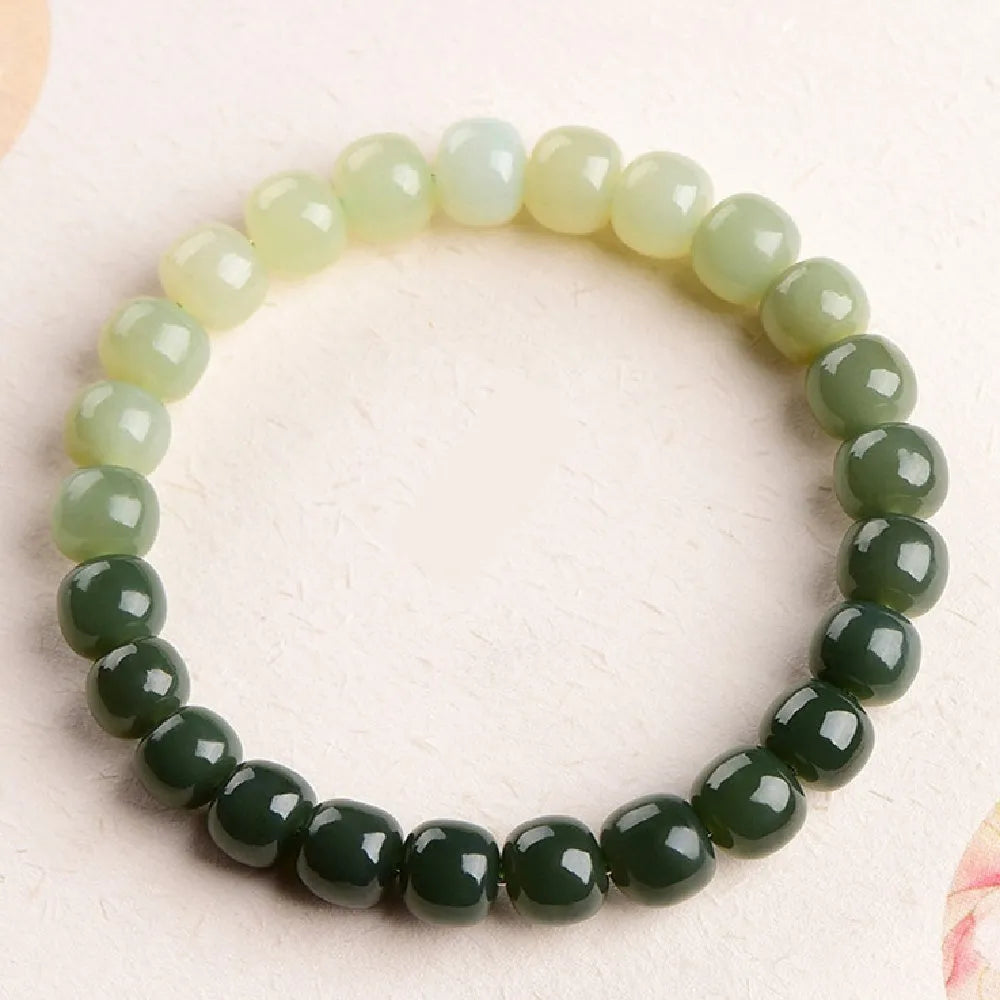 Natural Hetian jade water gradient bracelet with polished oval beads in unisex casual style