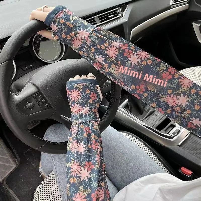 A pair of printed viscose ice silk sun protection sleeve gloves covering the forearm and elbow.