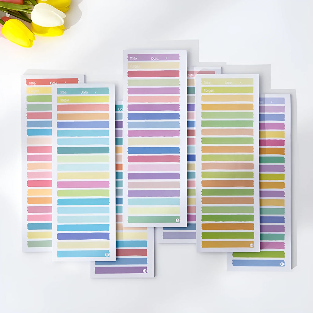 Colourful cartoon sticky note pad in plastic storage box, size 90 by 248 millimetres.