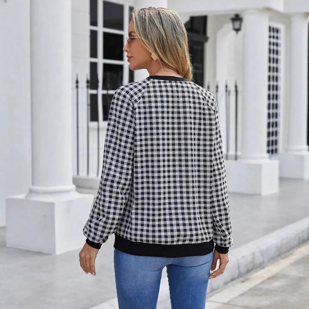 Black Japanese style plaid pullover sweater with long sleeves and printed pattern