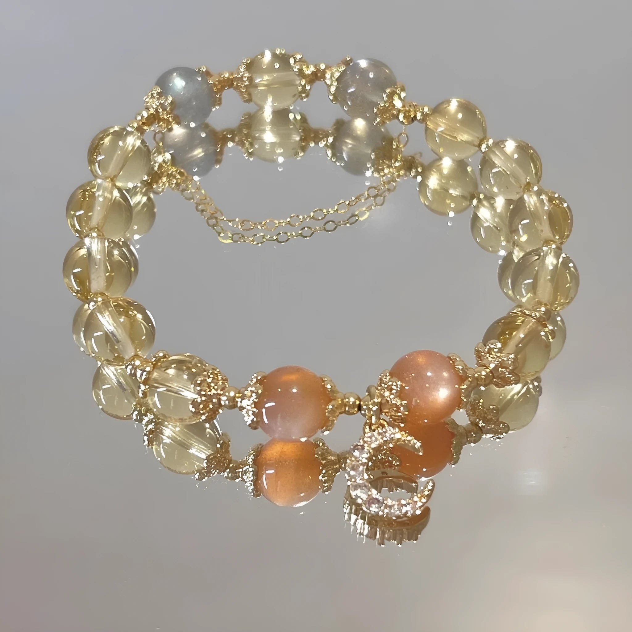 Women's Chinese-style crystal bracelet with citrine moonstone centrepiece and 14K gold electroplating