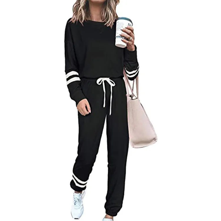 Women's plus size casual suit set in loose fit with long sleeves, shown in a solid colour.