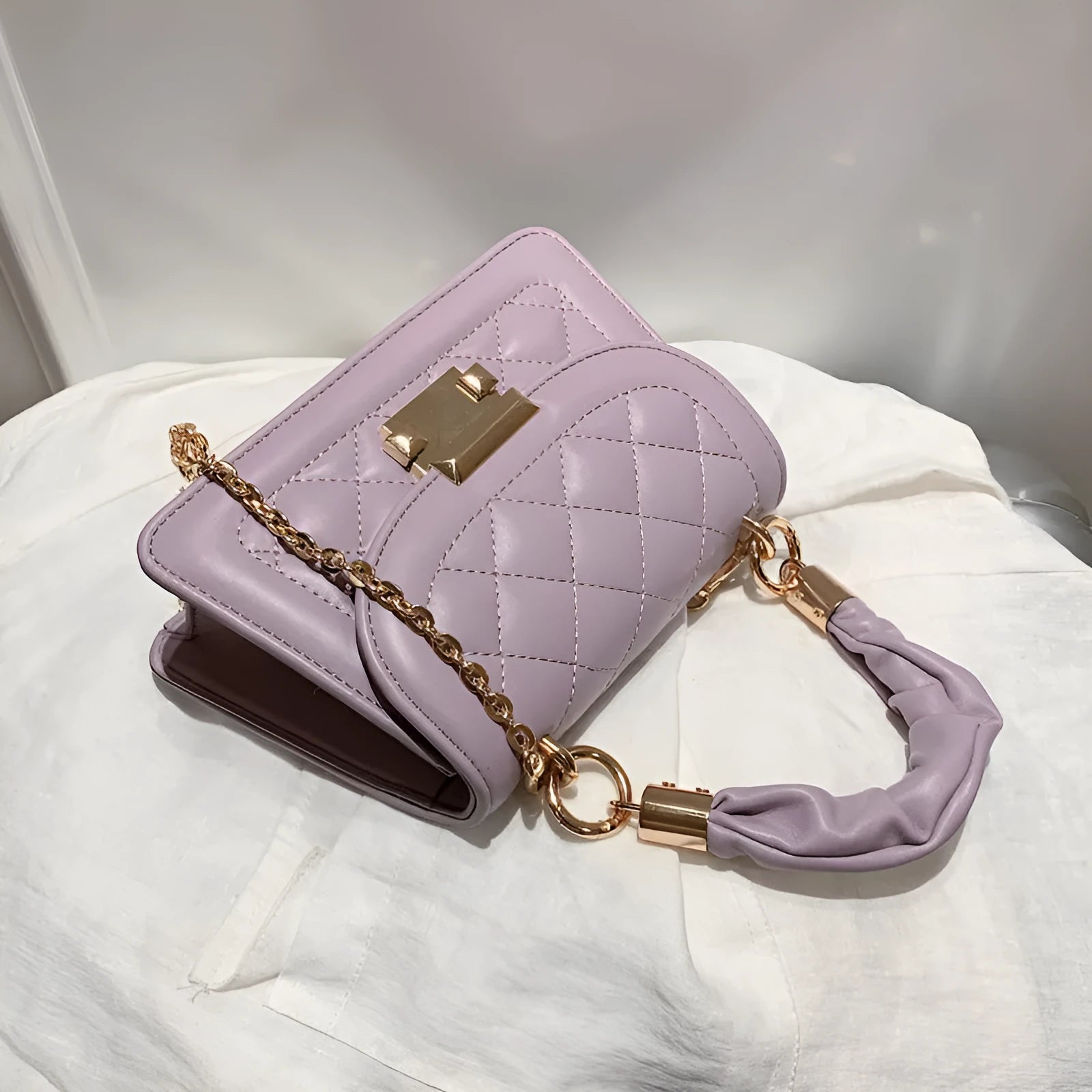 Purple rhombus-shaped ladies shoulder bag with chain strap and Korean styling