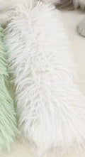 Soft plush cat toy pillow in blue, green, pink, or white, measuring 27cm long by 10cm wide