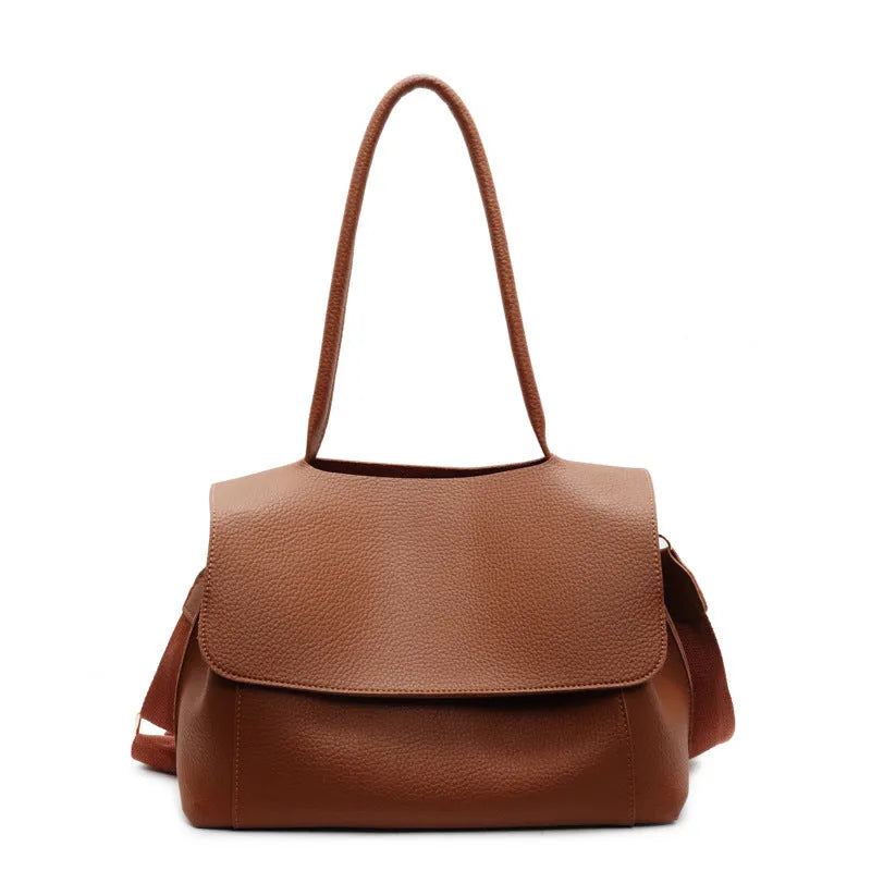 Square synthetic leather tote bag with double straps in a neutral colour.