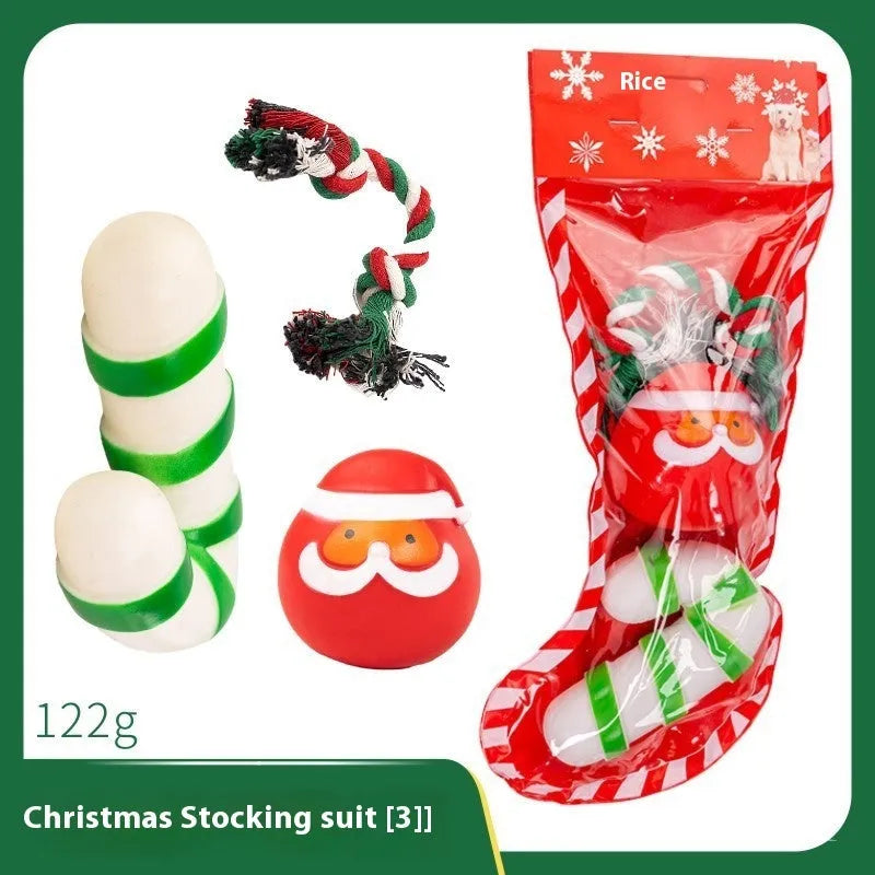 Set of colourful Christmas-themed vinyl dog chew toys including balls, ropes, and Santa figures.