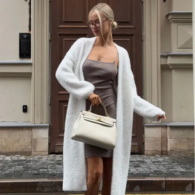 White women's cardigan sweater jacket with long sleeves and knitted texture