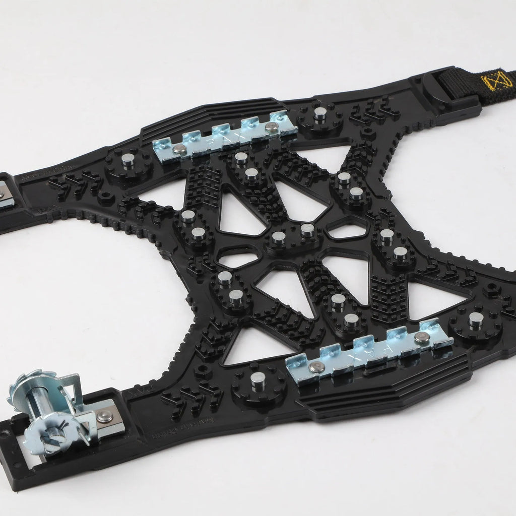 Steel plate snow chains for cars and SUVs with snow shovel and gloves in winter kit