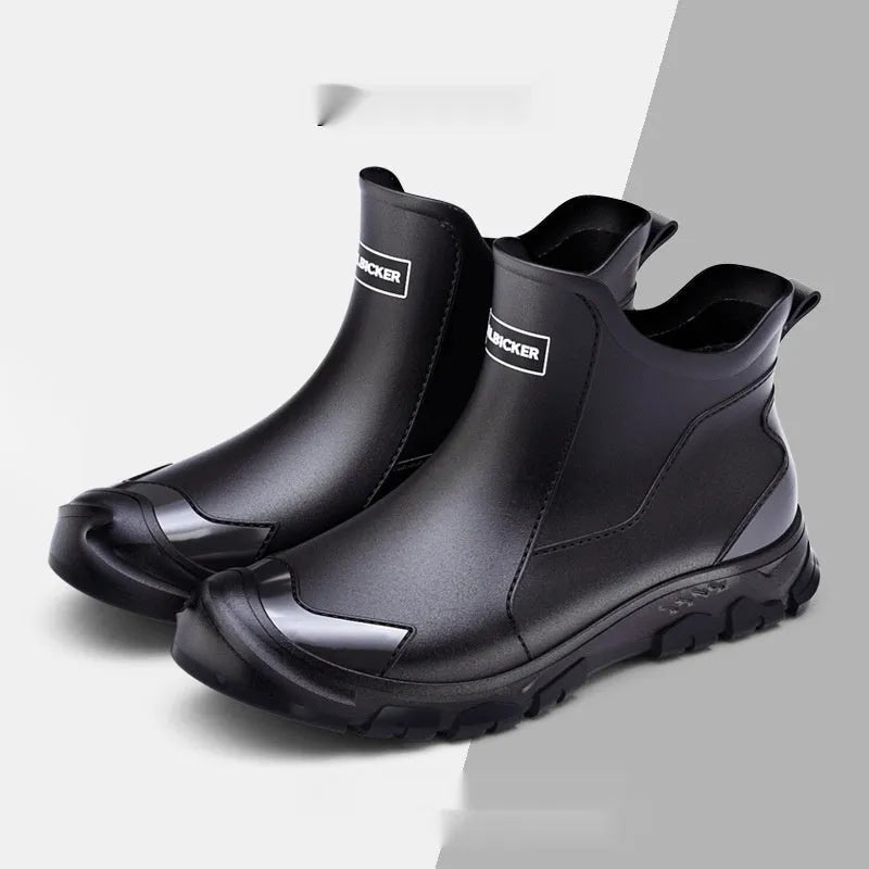 Short tube PVC wading shoe covers with round toe and non-slip plastic sole in solid colour.