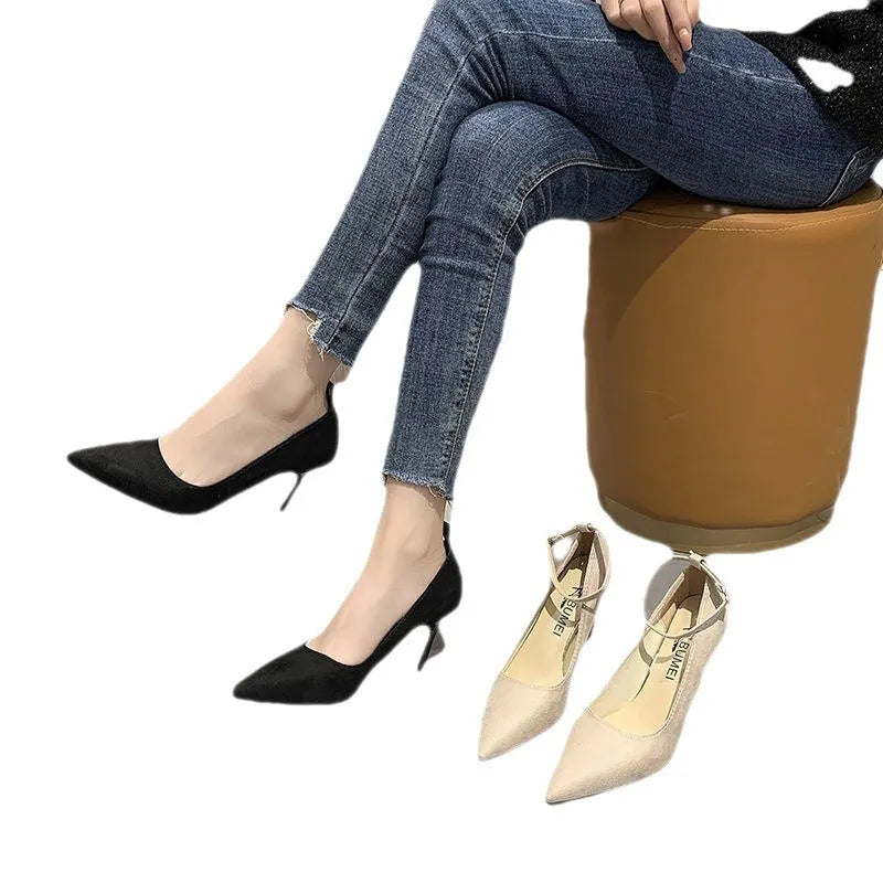 Women's black stiletto heel pump shoes with buckle detail and 8cm heel height