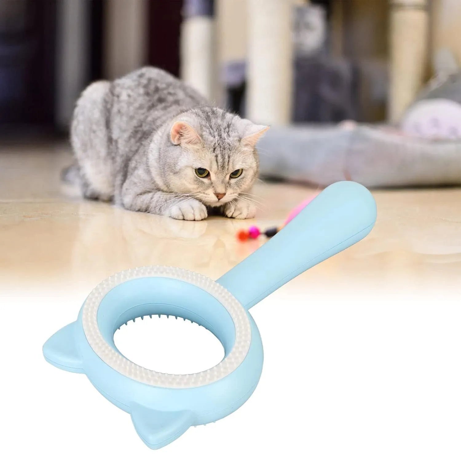 Blue and white dual-sided pet grooming brush with ergonomic handle for cats and dogs.