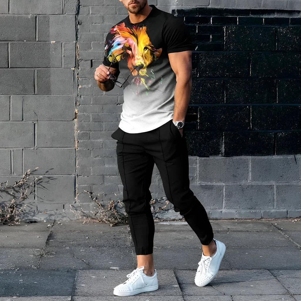 Man wearing a printed short-sleeve t-shirt and matching trousers from a cotton-like men's tracksuit set.