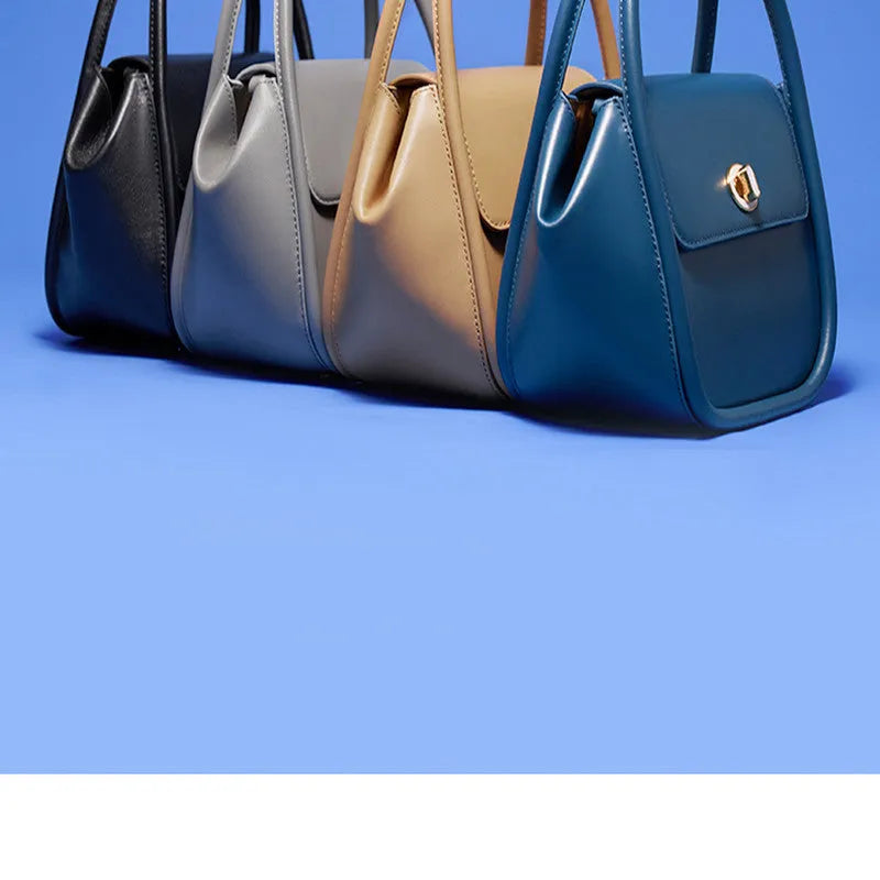 Leather wing-shaped tote cross-body bag in cow leather with single shoulder strap