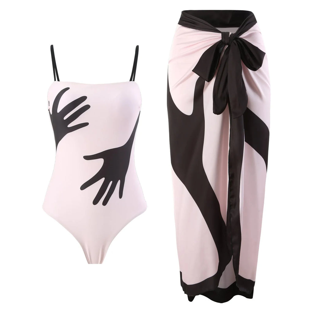 Patterned women's two-piece bikini swimsuit with a light tulle skirt.