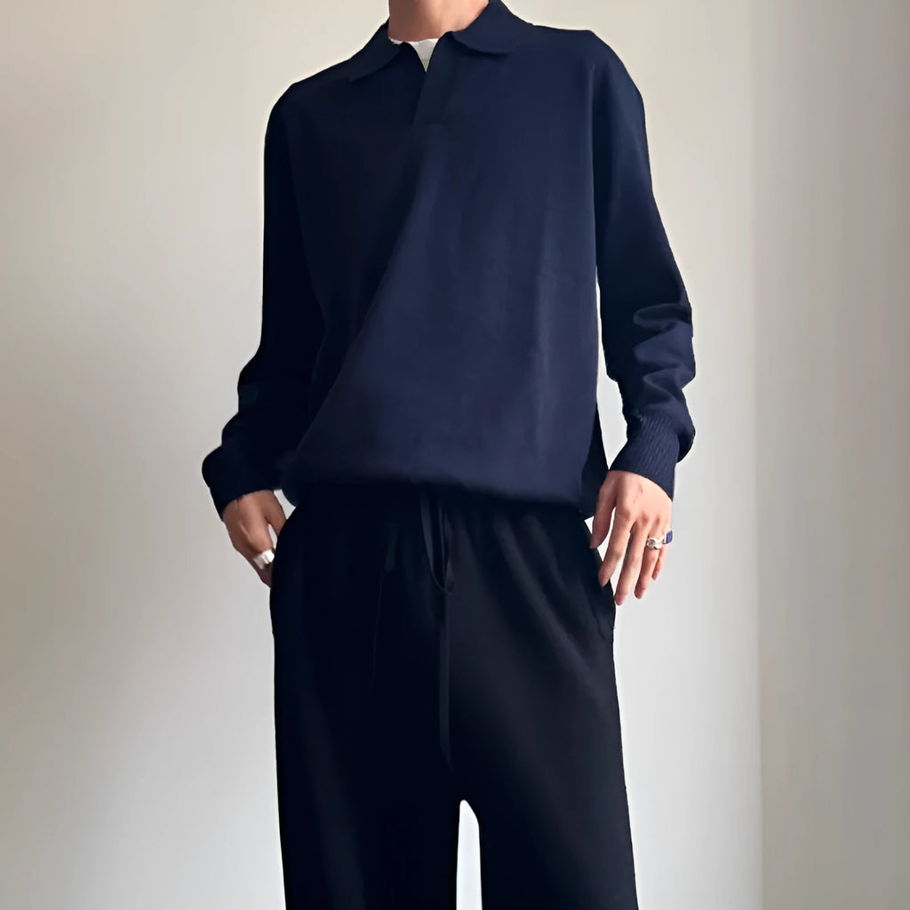 Man wearing a milky white pure wool sweater with a lapel collar and loose fit