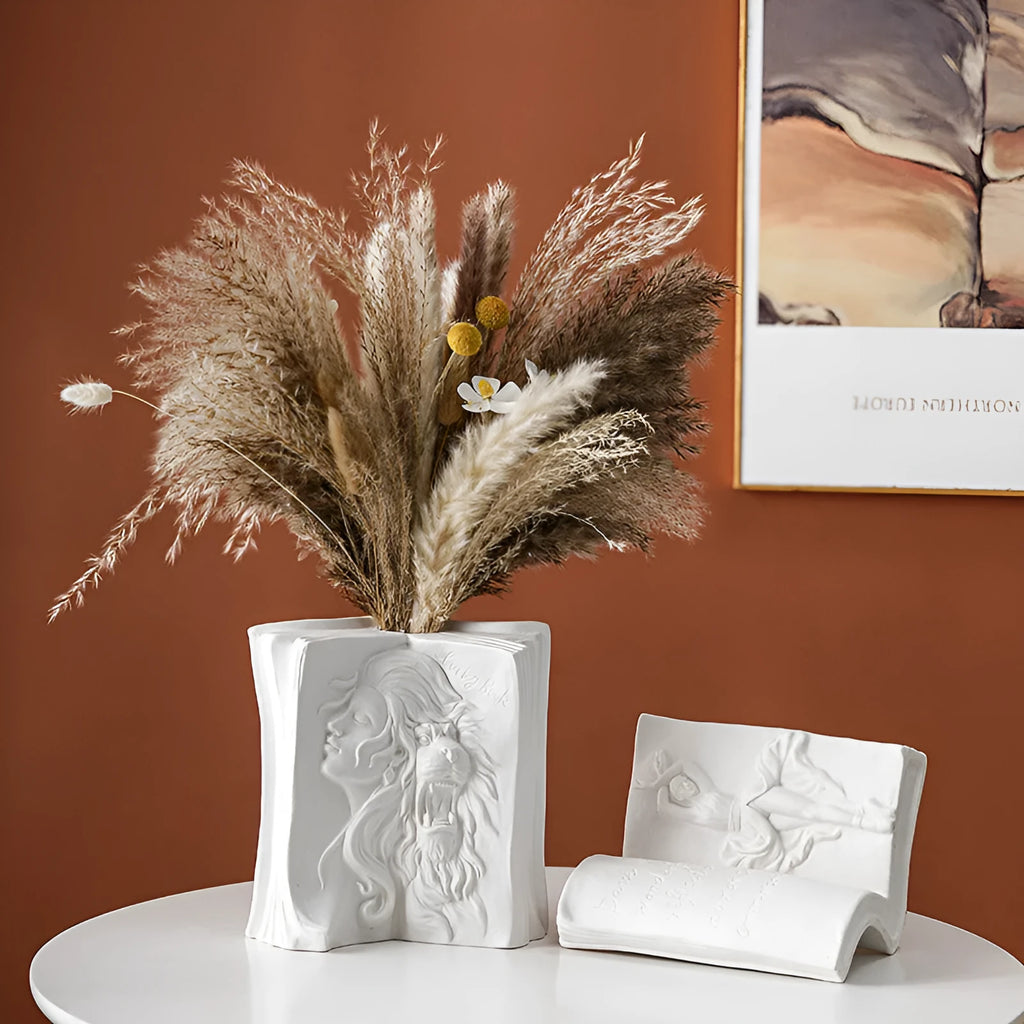 Ceramic book stand in a modern simple style with a glazed decorative pattern, holding a book upright.