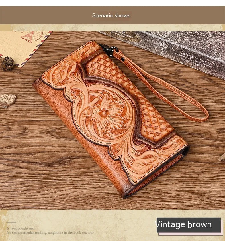 Chinese style embossed women's tri-fold wallet in genuine cowhide leather showing floral pattern detail