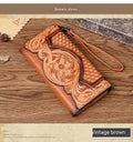 Chinese style embossed women's tri-fold wallet in genuine cowhide leather showing floral pattern detail
