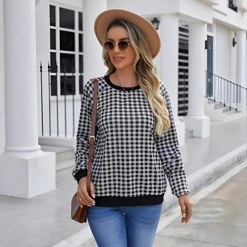 Black Japanese style plaid pullover sweater with long sleeves and printed pattern