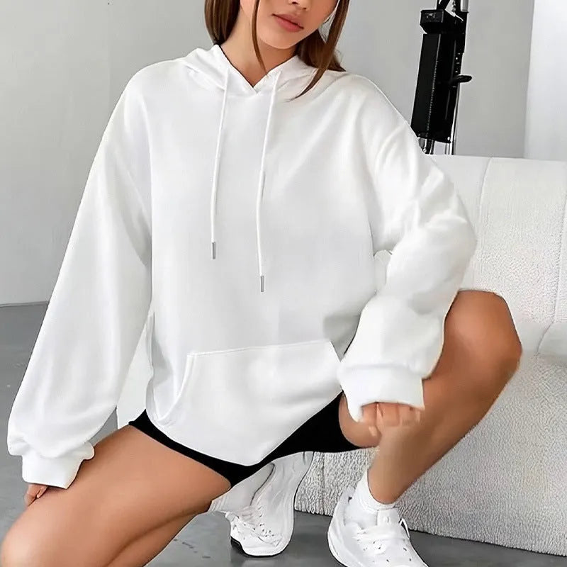 A loose-fitting women's long-sleeve sweatshirt with a drawstring pocket, shown in a solid colour.