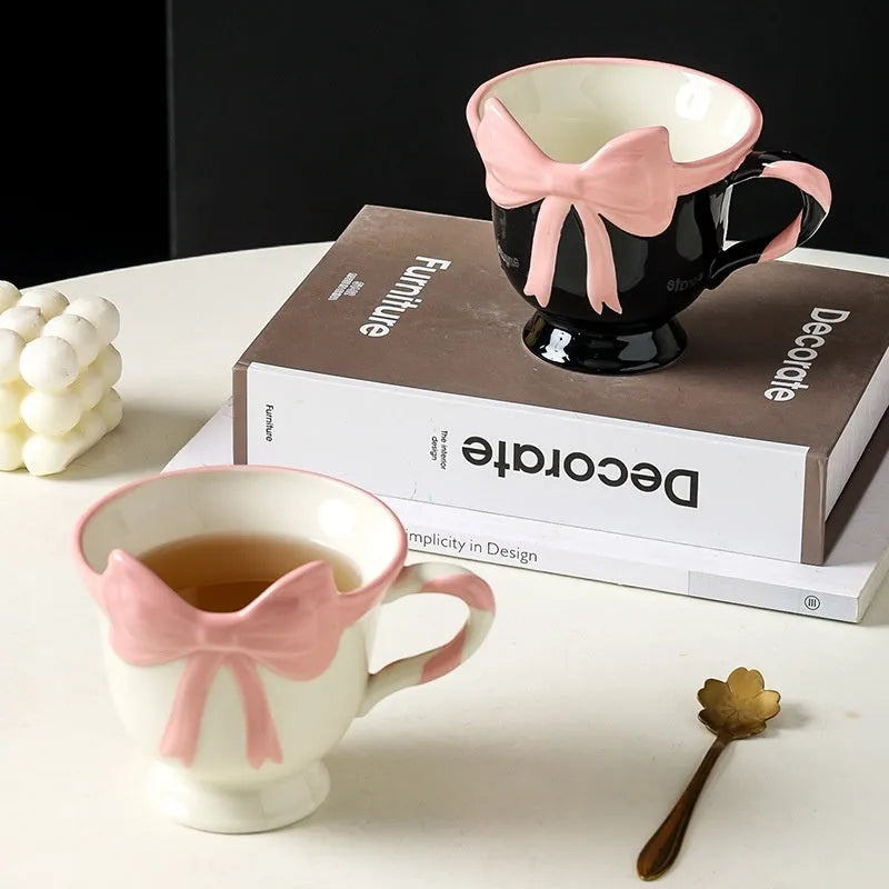 Ceramic heart bow mug with 301-400ml capacity in black pink or white powder colour