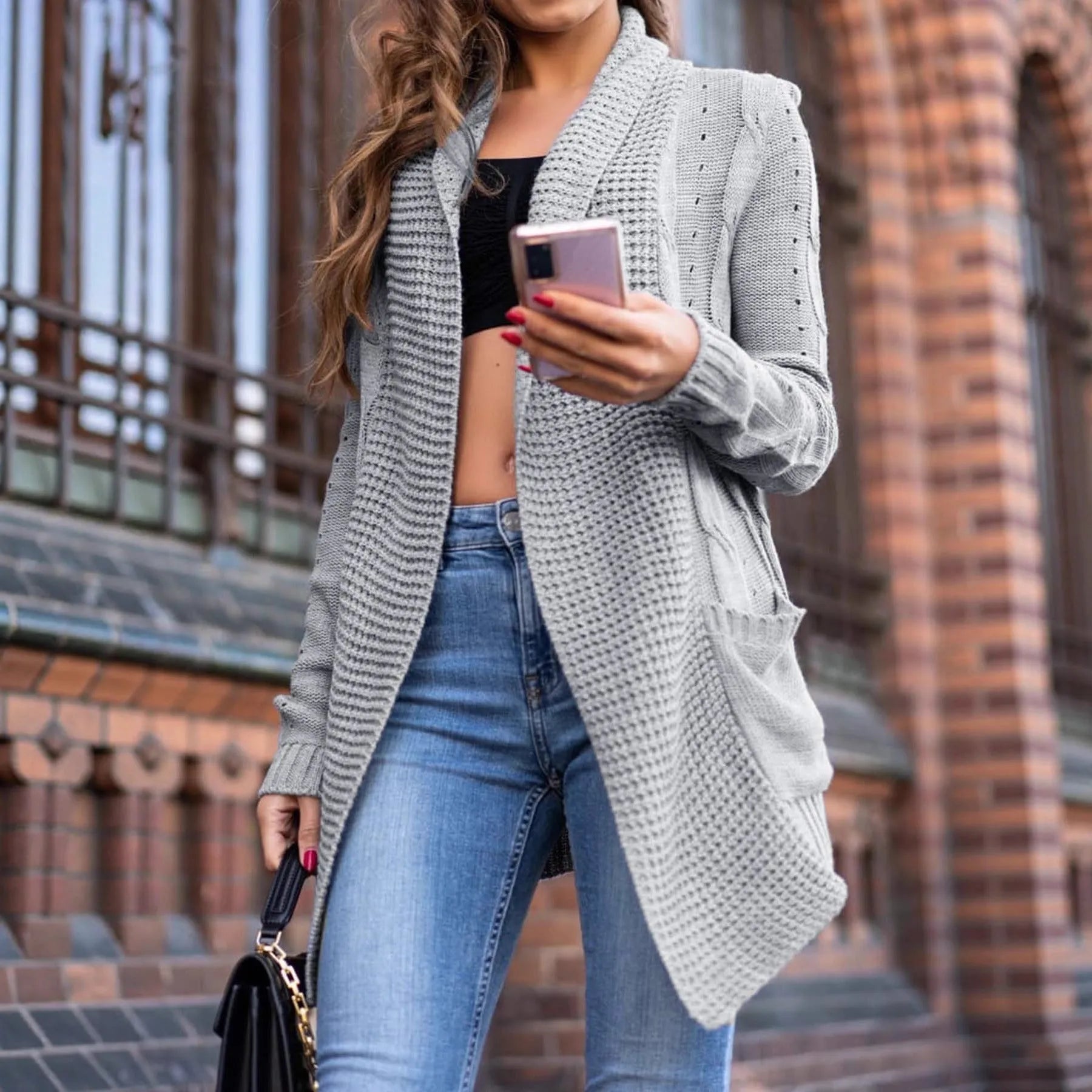 Grey women's loose fit cardigan coat with pockets, made from thick viscose fibre fabric.