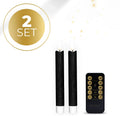 Set of four black LED taper candles with realistic 3D flame effect, measuring 18cm tall