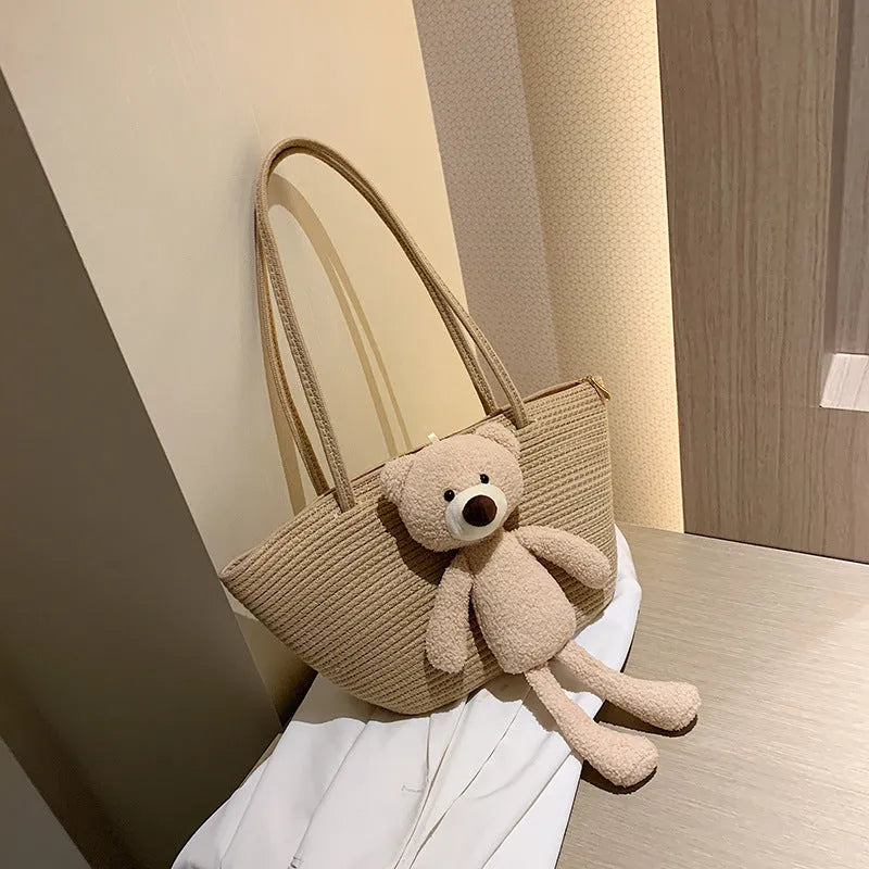 Cotton and linen woven bag with dumpling shape, double shoulder straps, and three-dimensional pocket